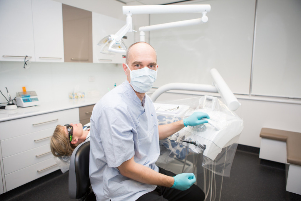 Dr Michael Wyatt providing dental care services to a patient in Geelong.